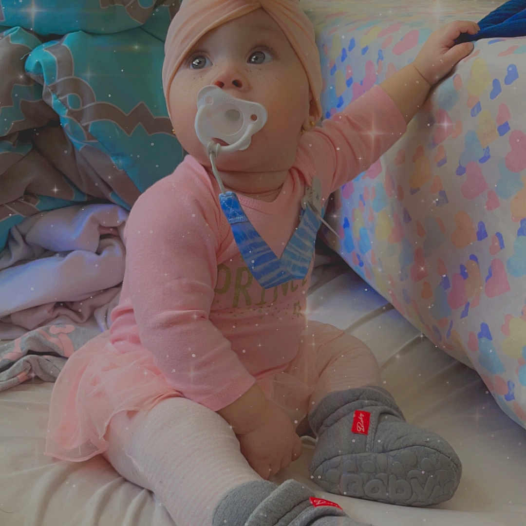 Sanya is registered to the contest to win money with this photo: baby, bodypart, bonnet, cap, clothing, couch, cushion, face, finger, footwear, furniture, glove, hand, hat, head, homedecor, person, photography, portrait, shoe