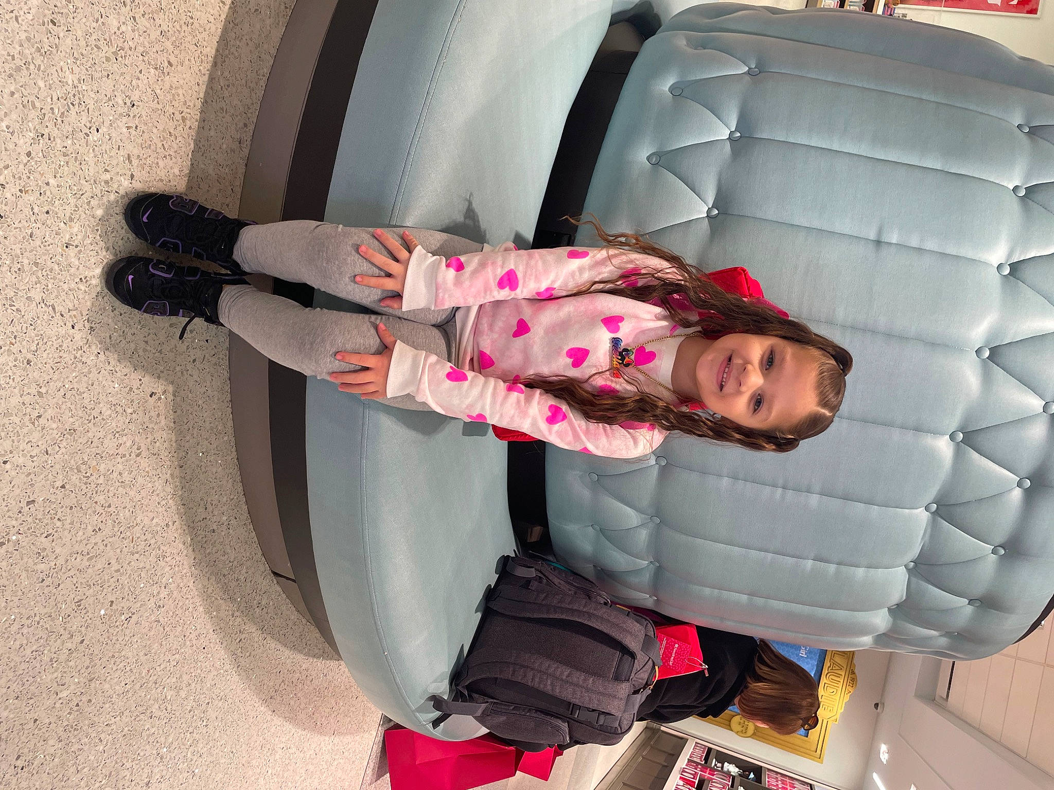 Meilani is registered to the contest to win money with this photo: auto_part, automotive_design, automotive_exterior, automotive_tire, automotive_wheel_system, boot, car, comfort, fun, human_leg, joy, leg, outdoor_shoe, person, pink, shoe, sneakers, synthetic_rubber, tire, toddler