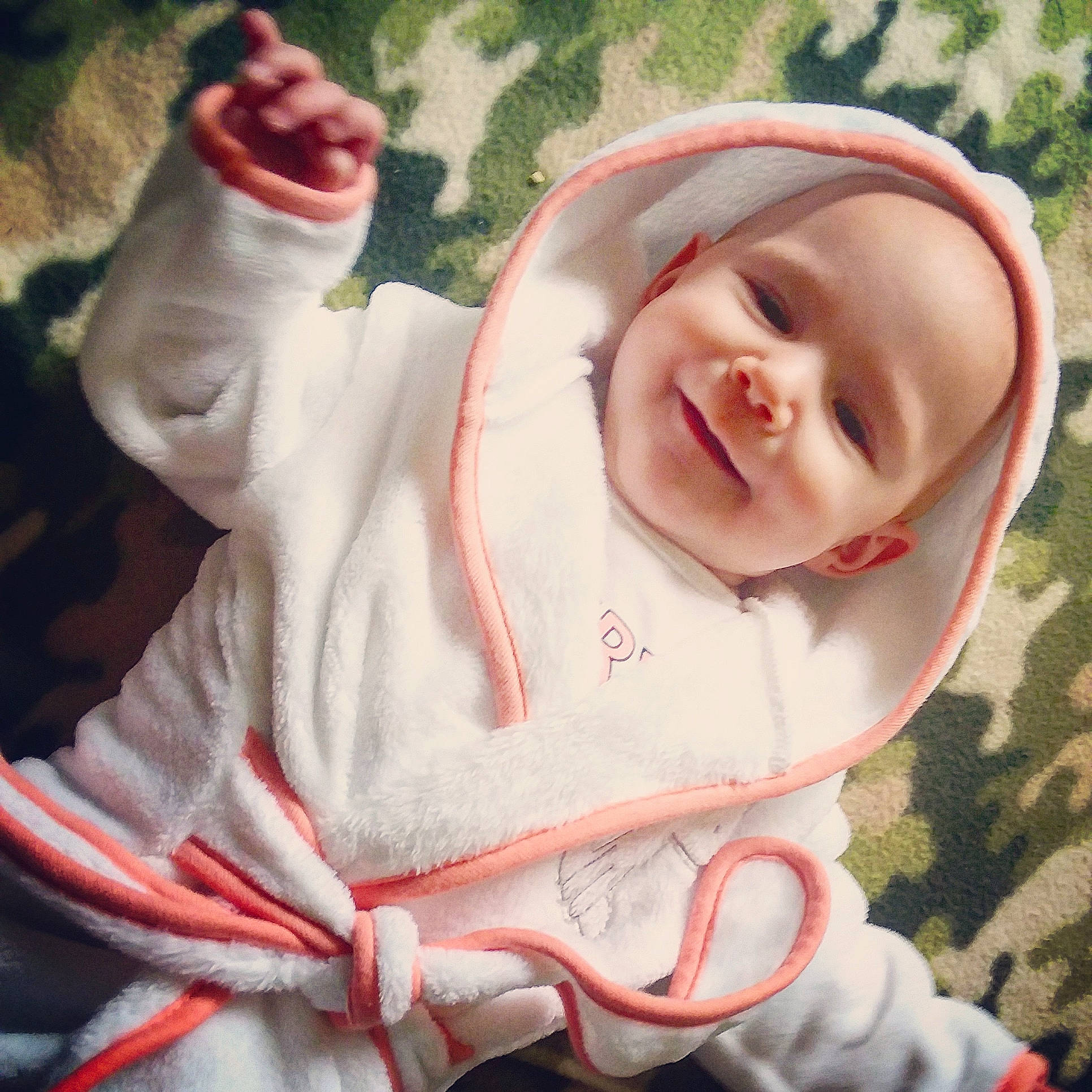 Pamela is registered to the contest to win money with this photo: cheek, child, ear, eye, face, facial_expression, girl, hair_accessory, head, infant, joy, nose, person, pink, product, skin, smile, toddler