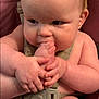 Adalynn joined the competition — help win amazing prizes! arm, baby, babylaughing, biting, blade, bodypart, dagger, face, finger, gun, hand, happy, head, knife, newborn, person, photography, portrait, sitting, weapon