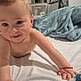 Luca Nicolae joined the competition — help win amazing prizes! baby, child, crawling, bed, blanket, mirror, bracelet, indoor, person, smiling, skin, hand, face, room, furniture, curious, young, soft_texture, comfort, home