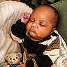 Kaizen is registered to the contest to win money with this photo: baby, blanket, child, close_up, comfort, cozy, crocheted_toy, cute, hand, indoors, infant, knit_toy, newborn, peaceful, portrait, resting, sleeping, soft_lighting, striped_clothing, teddy_bear