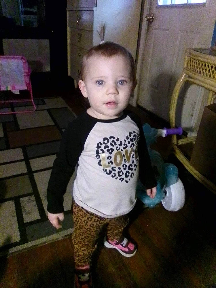 Isabella is registered to the contest to win money with this photo: baby, baby_toddler_clothing, chair, child, floor, flooring, fun, happy, mammal, pattern, person, room, sandal, shoe, skin, sleeve, standing, t_shirt, toddler, window