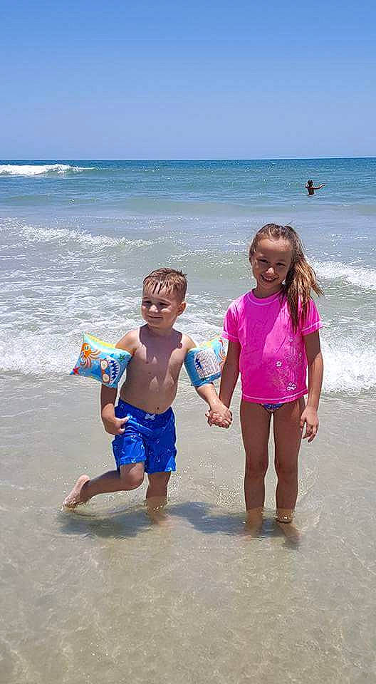 Emily joined the competition — help win amazing prizes! beach, body_of_water, child, coast, coastal_and_oceanic_landforms, fun, girl, joy, leisure, ocean, person, play, sand, sea, shore, sky, summer, swimwear, tourism, vacation