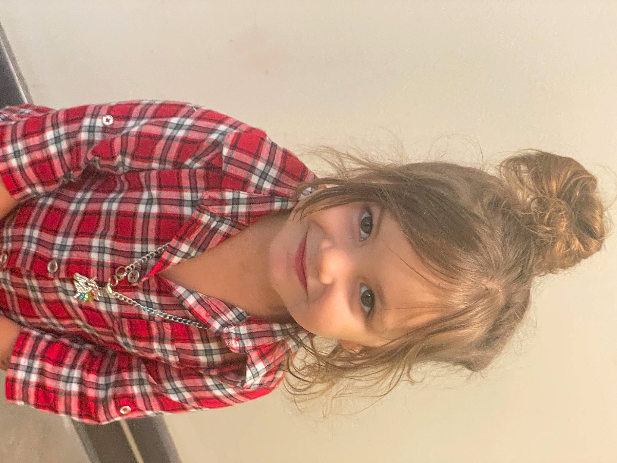 Terra is registered to the contest to win money with this photo: collar, comfort, eye, eyelash, happy, joy, pattern, person, plaid, portrait_photography, sleeve, smile, tartan, toddler