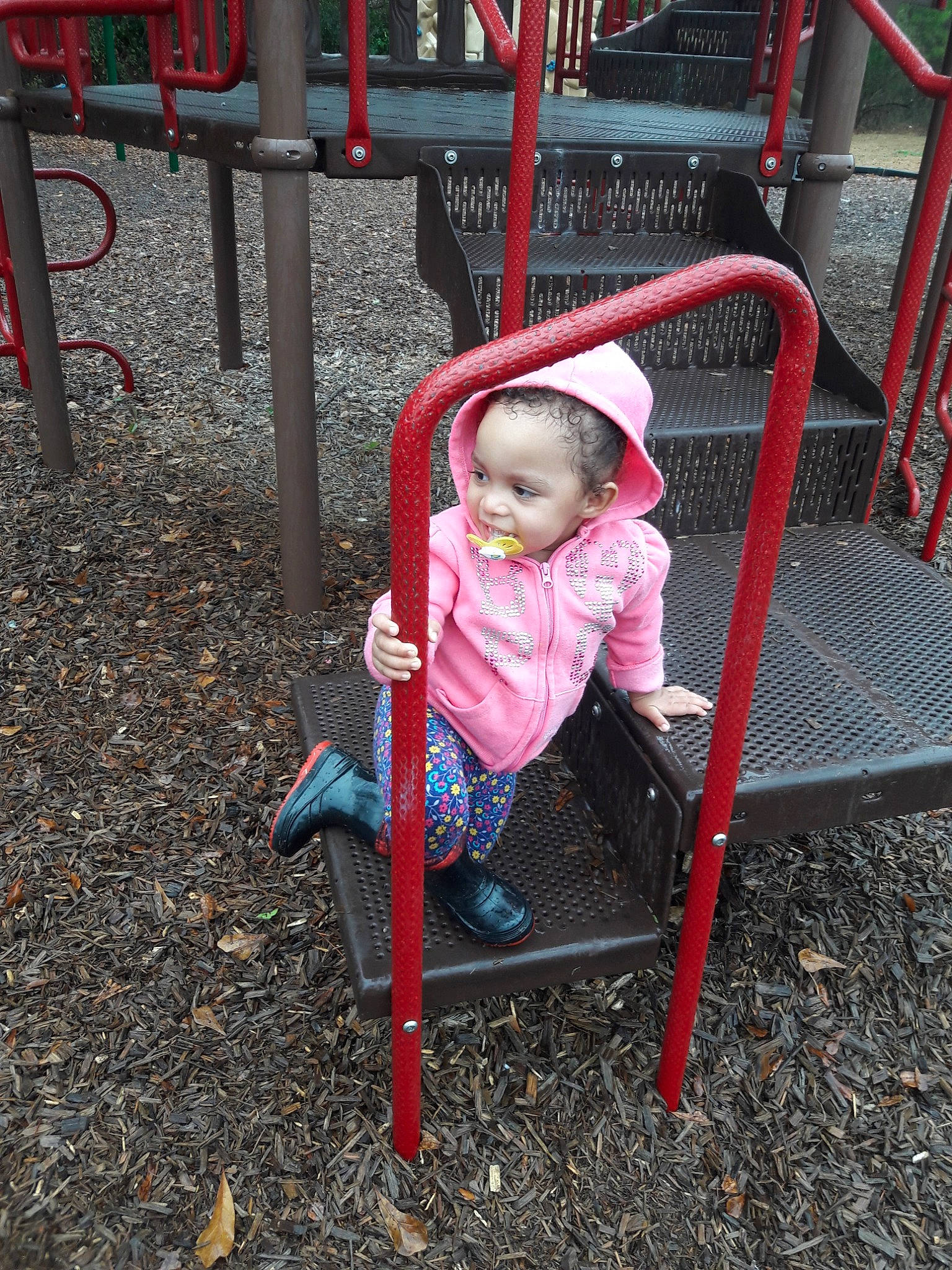 Ariyannah joined the competition — help win amazing prizes! chair, child, fun, girl, joy, outdoor_play_equipment, person, pink, play, playground, product, public_space, recreation, red, sitting, swing, toddler, tree