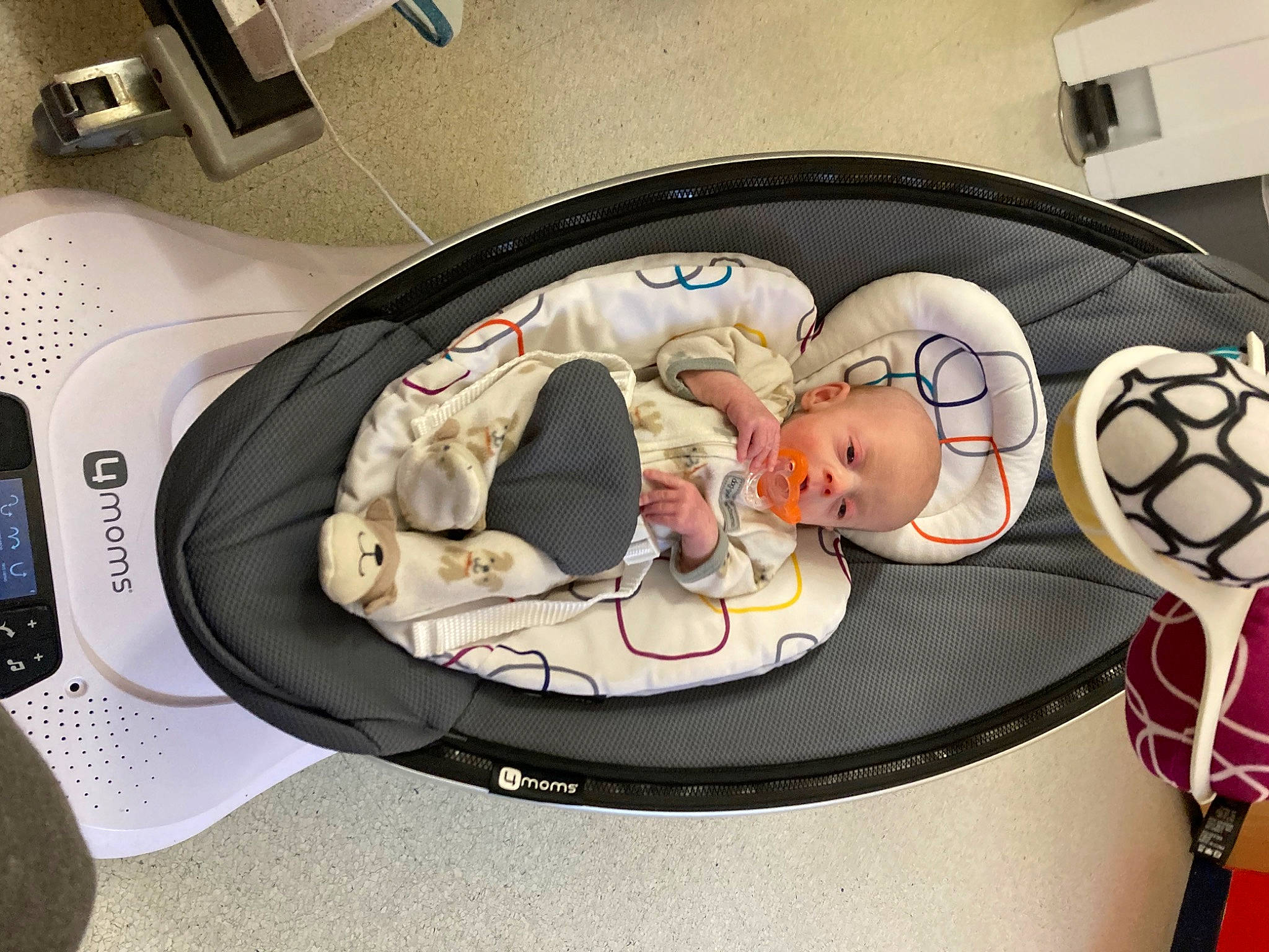 Angelica is registered to the contest to win money with this photo: baby, baby_carriage, baby_products, baby_toys, child, comfort, comfort_food, flooring, football, infant_bed, linens, pattern, person, plaid, room, table, toddler, toy, vehicle_door