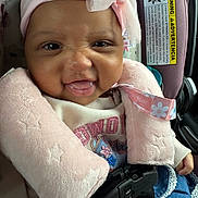 Kadence joined the competition — help win amazing prizes! baby, infant, car_seat, pink_headband, pink_jacket, denim, cute, smiling, face, child, seatbelt, clothing, happy, portrait, indoors, closeup, headwear, baby_girl, safety, expression