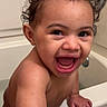 baby, child, toddler, smiling, laughing, portrait, bathroom, bathtub, bath_time, wet, curly_hair, bare_shoulders, face, eyes, mouth, happy, indoor, close_up, water, family_photo