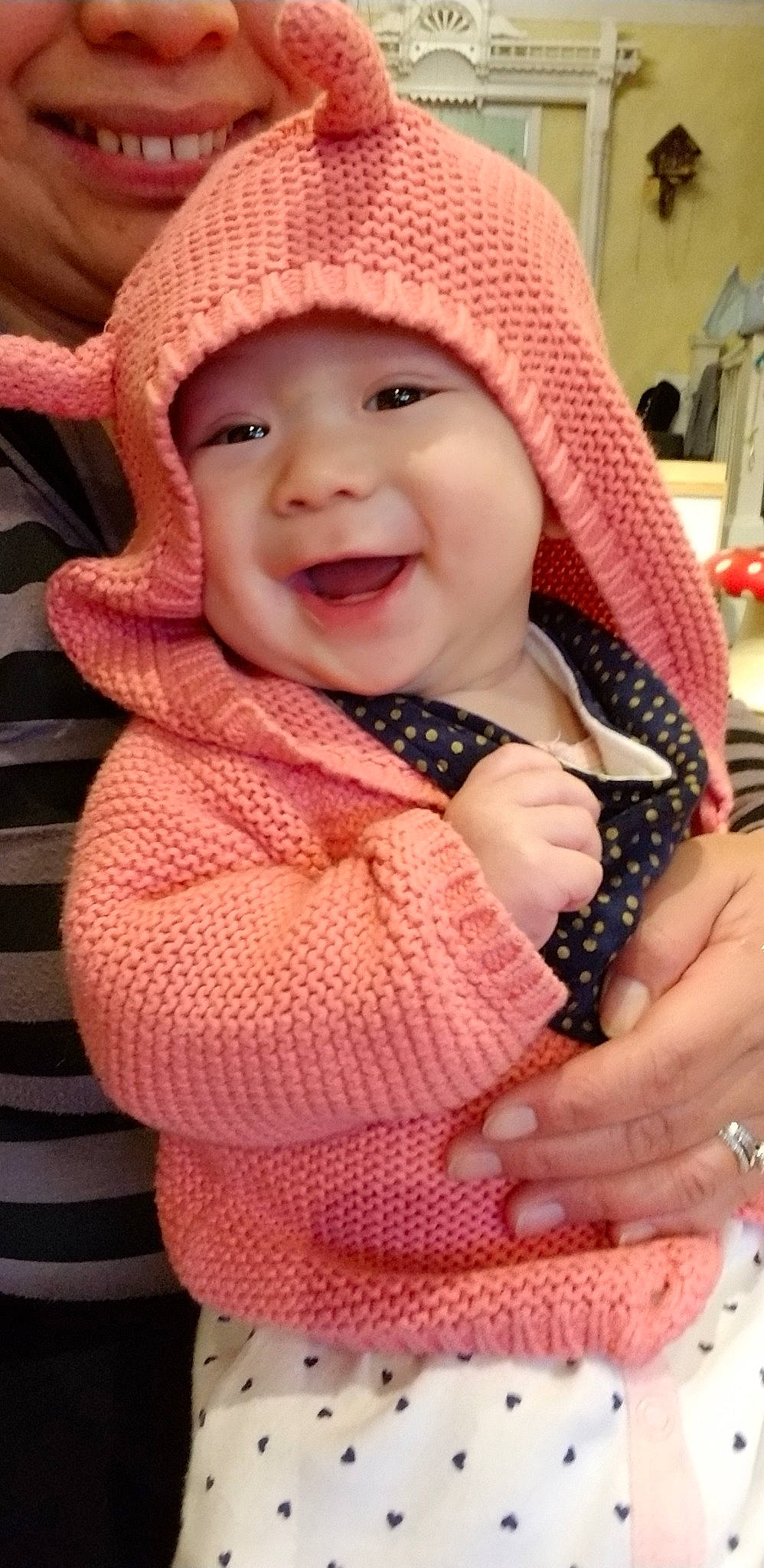 Ashley is registered to the contest to win money with this photo: beanie, cap, cheek, child, crochet, design, girl, hat, headgear, headwear, infant, knit_cap, knitting, nose, person, pink, product, scarf, skin, textile