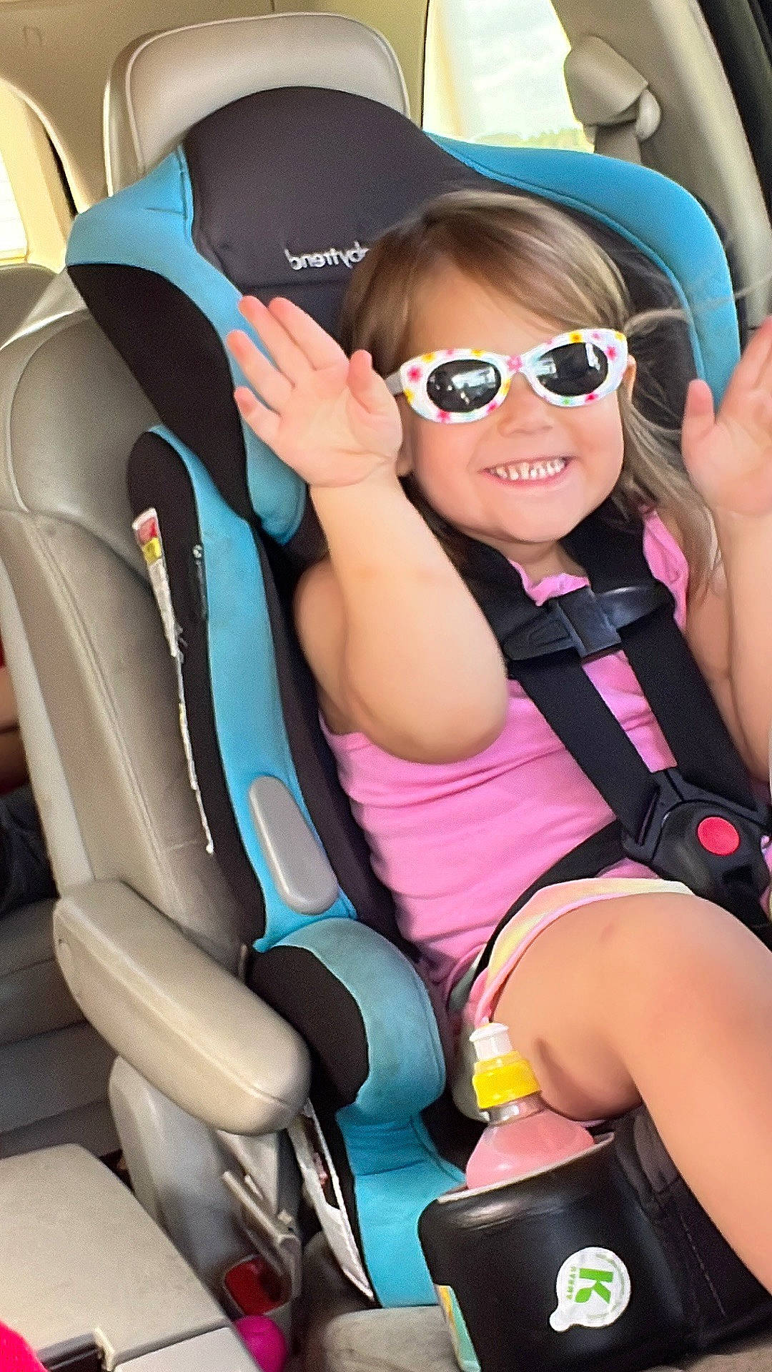 Lillieann is registered to the contest to win money with this photo: auto_part, automotive_design, car_seat, car_seat_cover, eyewear, fun, glasses, goggles, happy, head_restraint, joy, motor_vehicle, person, seat_belt, smile, steering_wheel, sunglasses, tableware, thigh, toddler