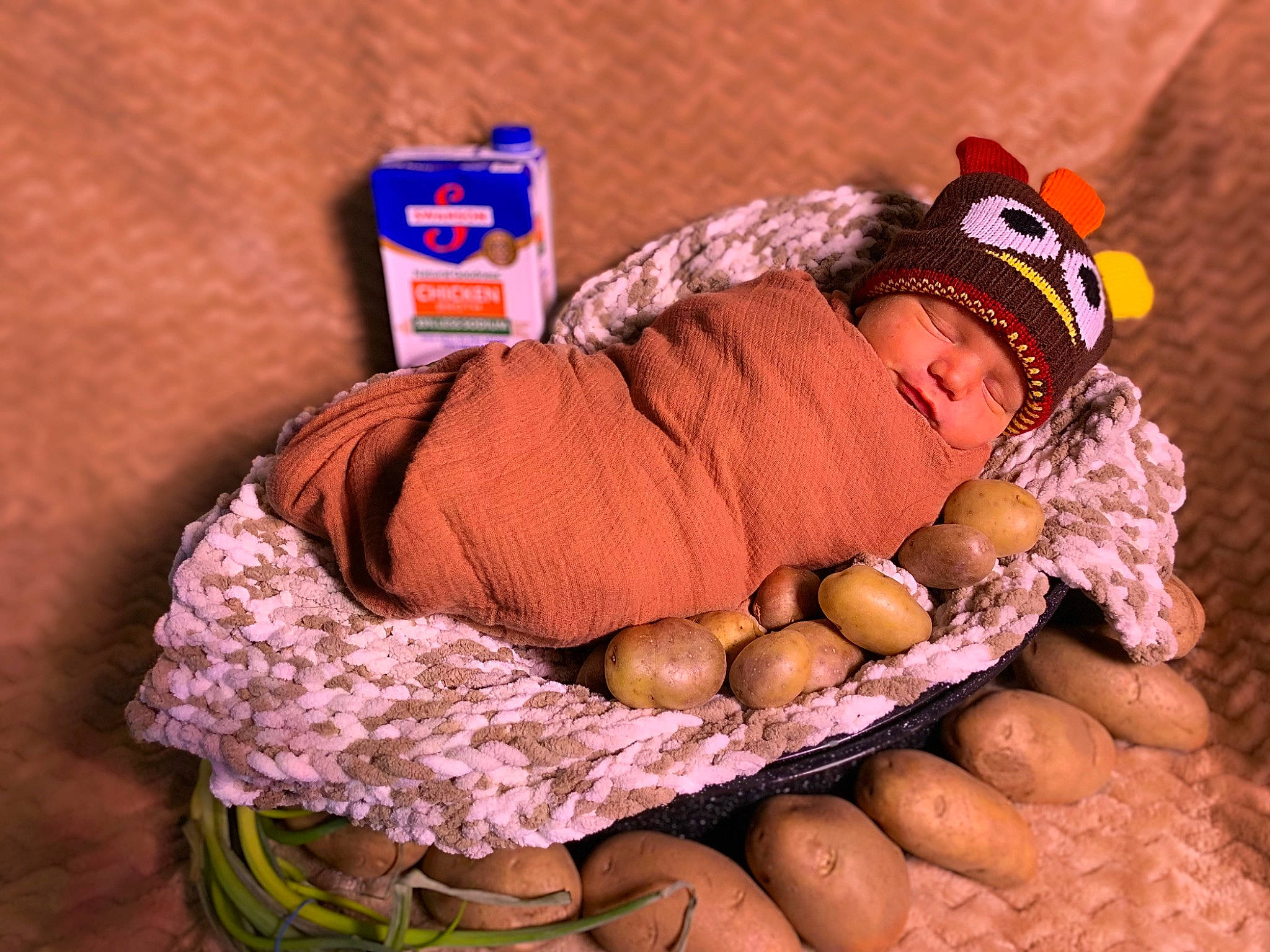 Bohdan is registered to the contest to win money with this photo: baby, baby_sleeping, baby_toddler_clothing, basket, calabaza, child, comfort, fruit, gourd, happy, hat, headwear, natural_foods, person, plant, pumpkin, purple, sitting, toddler, vegetable