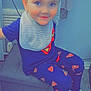 Corey joined the competition — help win amazing prizes! child, boy, smile, blue_eyes, pajamas, superman_logo, bib, sitting, indoor, ottoman, floor, wooden_floor, clothing, cute, happy, face, short_hair, sock, home, portrait