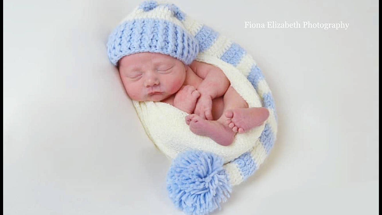 Hartley joined the competition — help win amazing prizes! baby, baby_products, baby_sleeping, baby_toddler_clothing, beanie, blue, bonnet, cap, child, crochet, headgear, headwear, knit_cap, knitting, nap, pattern, person, product, sleep, textile