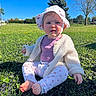 baby, child, grass, outdoor, sunny, hat, cardigan, pants, barefoot, nature, blue_sky, tree, greenery, cute, sitting, person, infant, daylight, playful, young