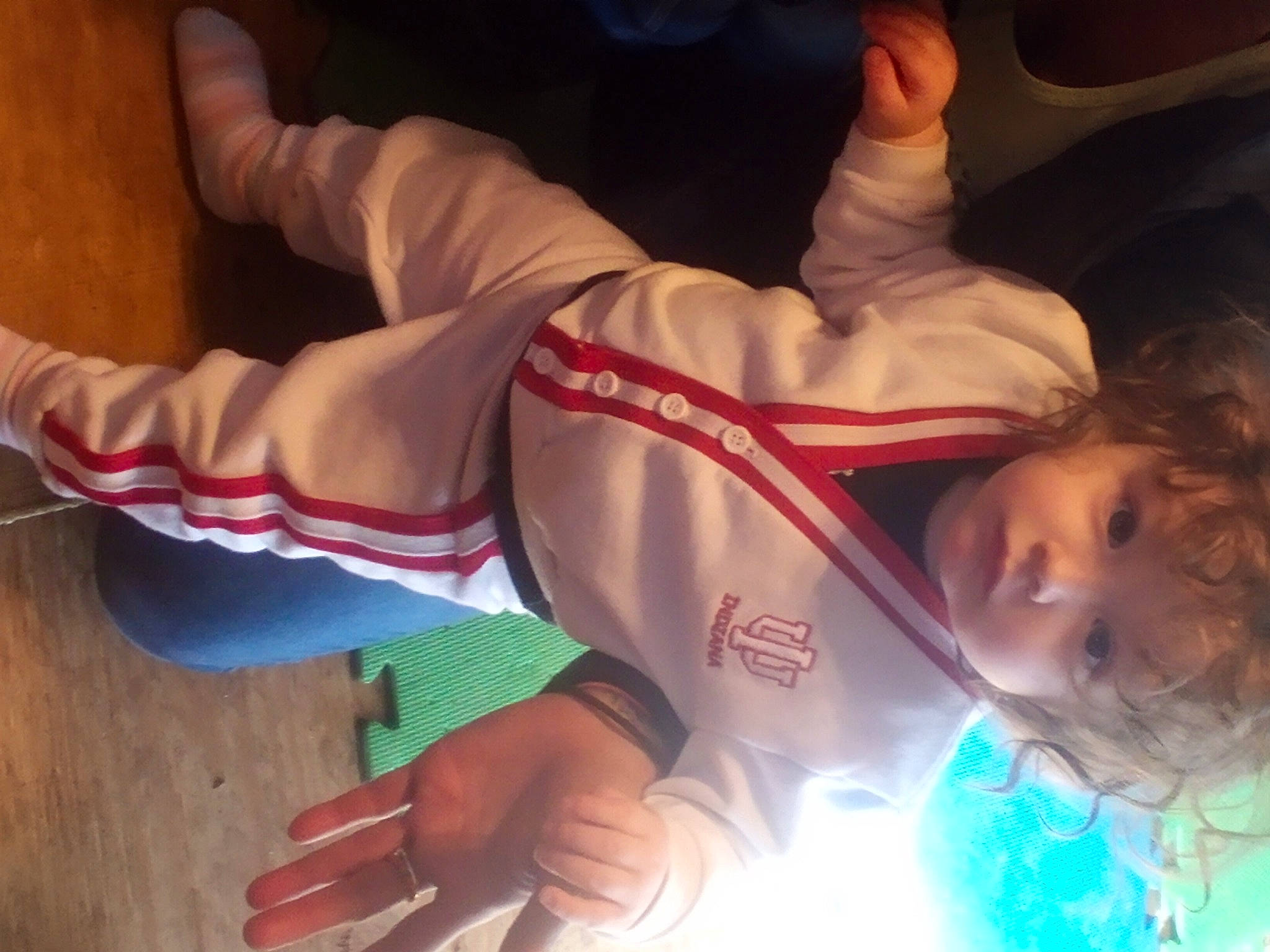 Olivia is registered to the contest to win money with this photo: child, contact_sport, dobok, elbow, finger, fun, gesture, happy, human_body, human_leg, karate, knee, martial_arts_uniform, nail, person, sportswear, thigh, thumb, toddler, tree