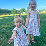 Sophia joined the competition — help win amazing prizes! child, children, grass, outdoor, dress, holding_hands, blue_sky, summer, happy, smiling, person, nature, two_girls, cute, playful, young, sunlight, greenery, footwear, portrait