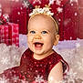 baby, child, smiling, happy, festive, holiday, christmas, red_dress, headband, reindeer_antlers, snowflakes, snow, presents, blue_eyes, indoor, portrait, cute, celebration, sparkle, toddler