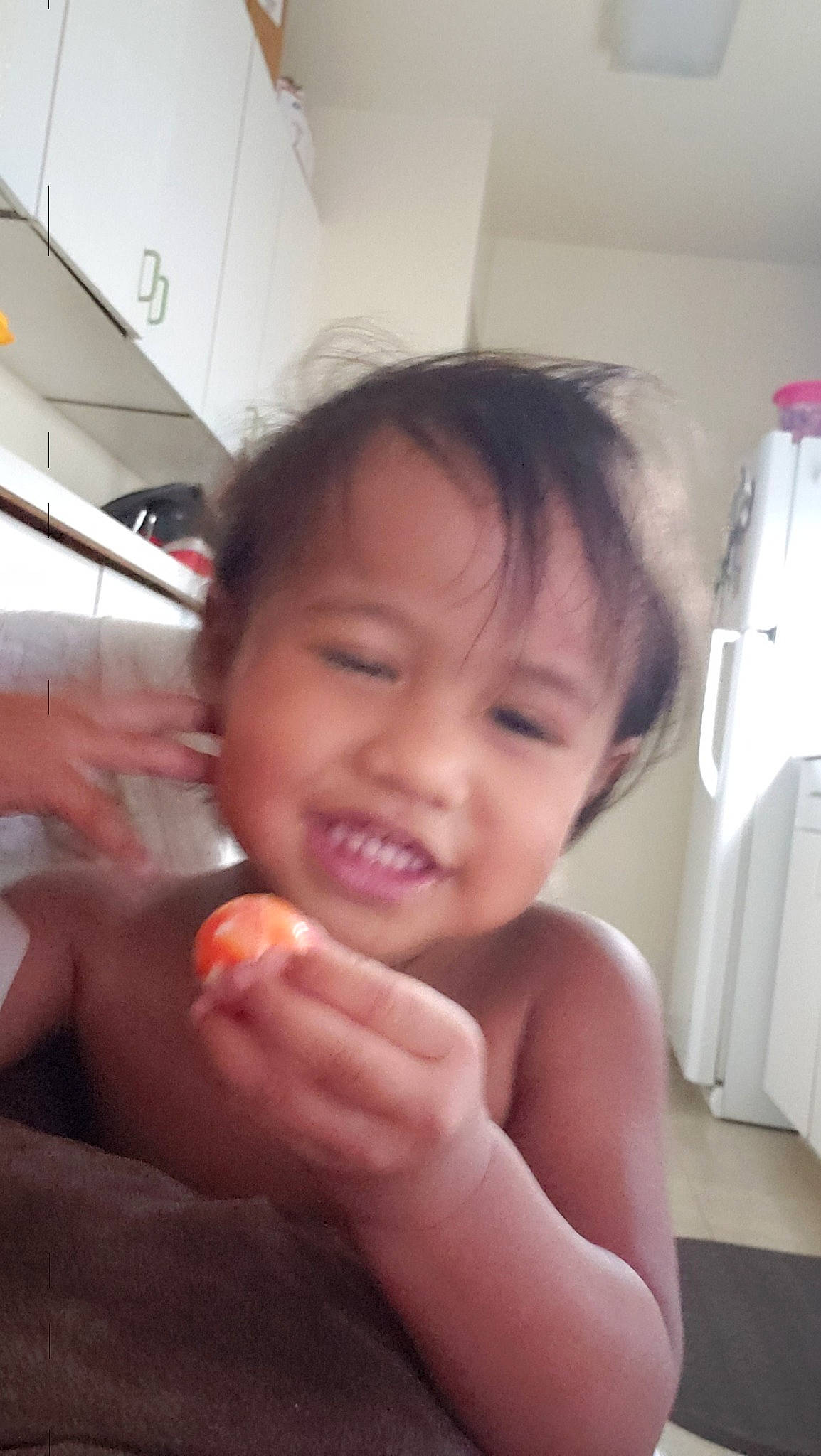 Zviana is registered to the contest to win money with this photo: baby, black_hair, cheek, child, ear, eye, face, facial_expression, finger, hand, joy, lip, mouth, neck, nose, person, skin, smile, thumb, toddler