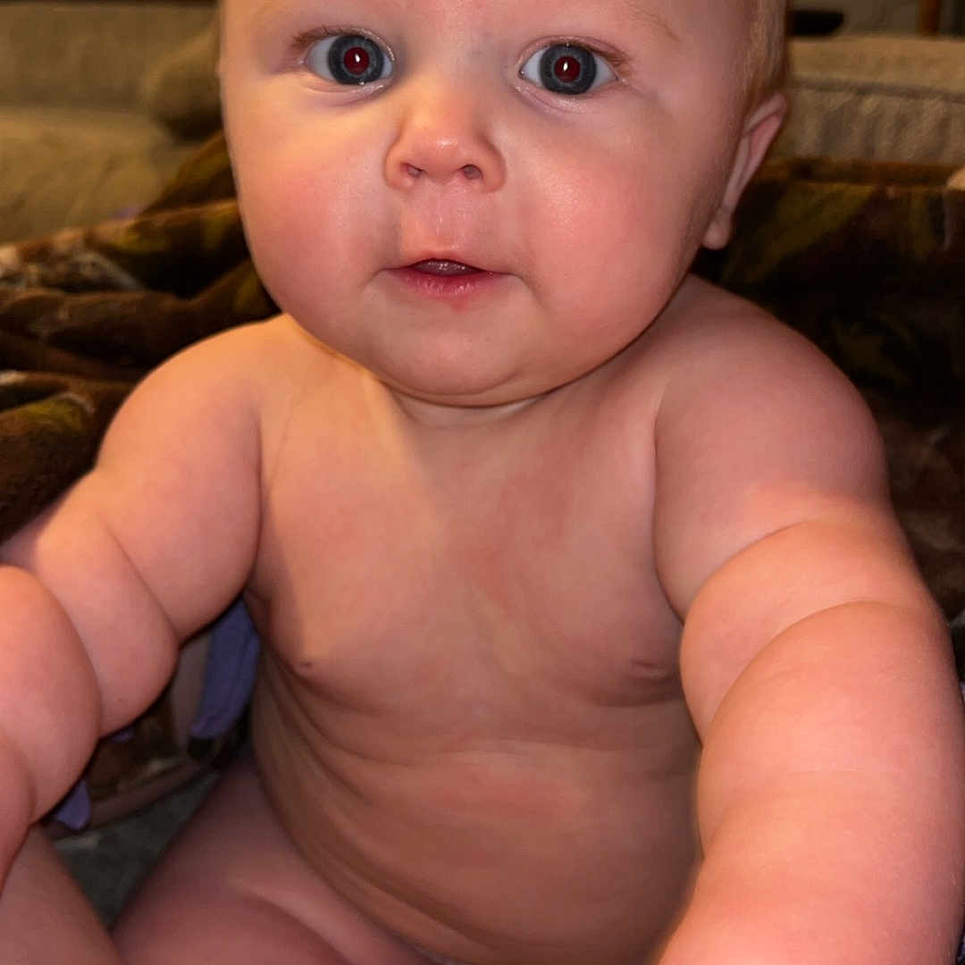 Cliffton joined the competition — help win amazing prizes! architecture, baby, bodypart, building, couch, crawling, diaper, face, finger, frown, furniture, hand, head, indoors, livingroom, mouth, newborn, person, photography, portrait