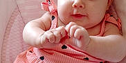 Rosalia participe au concours pour gagner de l'argent avec cette photo : baby, infant, child, pink_dress, headband, heart_pattern, cute, padded_seat, indoor, soft_fabric, chubby_cheeks, hands, legs, portrait, smiling, comfortable, seated, closeup, adorable, young