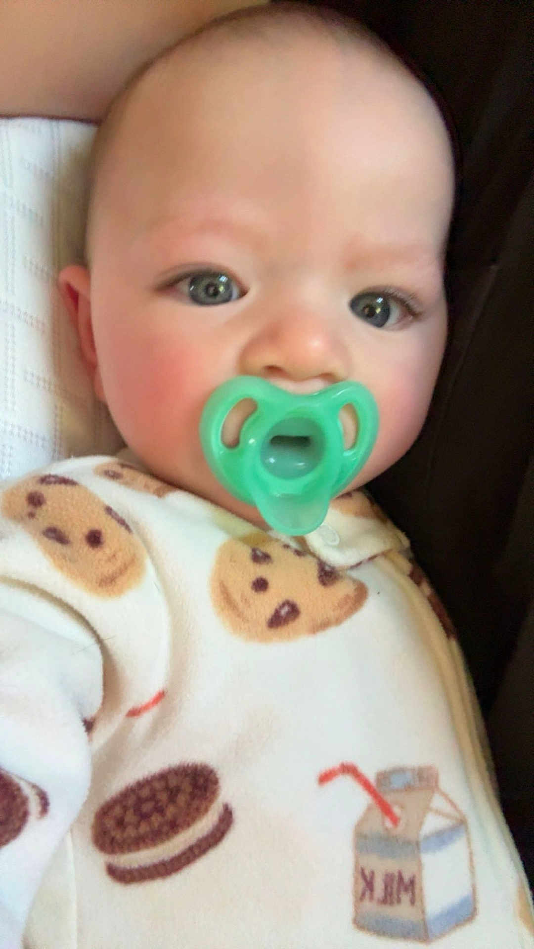 Axel joined the competition — help win amazing prizes! baby, pacifier, onesie, cookie_pattern, milk_carton_pattern, infant, close_up, face, child, cute, soft_fabric, sleepwear, indoor, comfort, head, expression, skin, person, young, resting