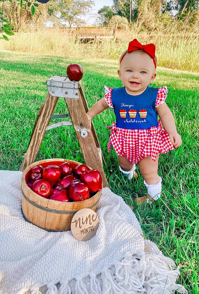 Adalee joined the competition — help win amazing prizes! apple, baby_toddler_clothing, basket, food, fruit, grass, hand, happy, ingredient, joy, natural_foods, people_in_nature, person, plant, produce, recreation, red, seedless_fruit, shorts, strawberry