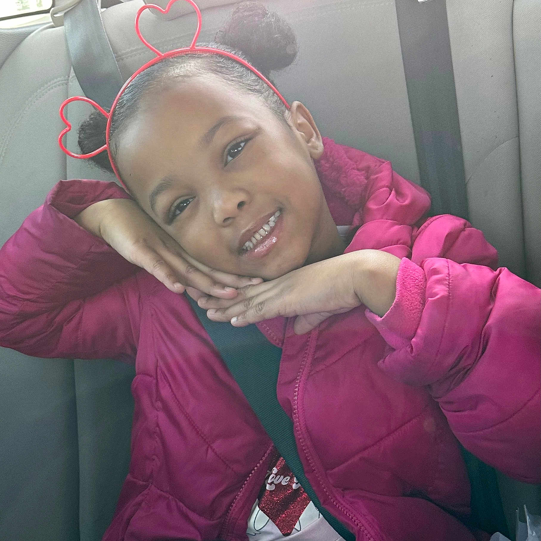 Amaya is registered to the contest to win money with this photo: accessories, child, clothing, coat, cushion, earring, face, female, girl, happy, head, homedecor, jacket, jewelry, person, photography, portrait, purple, selfie, smile