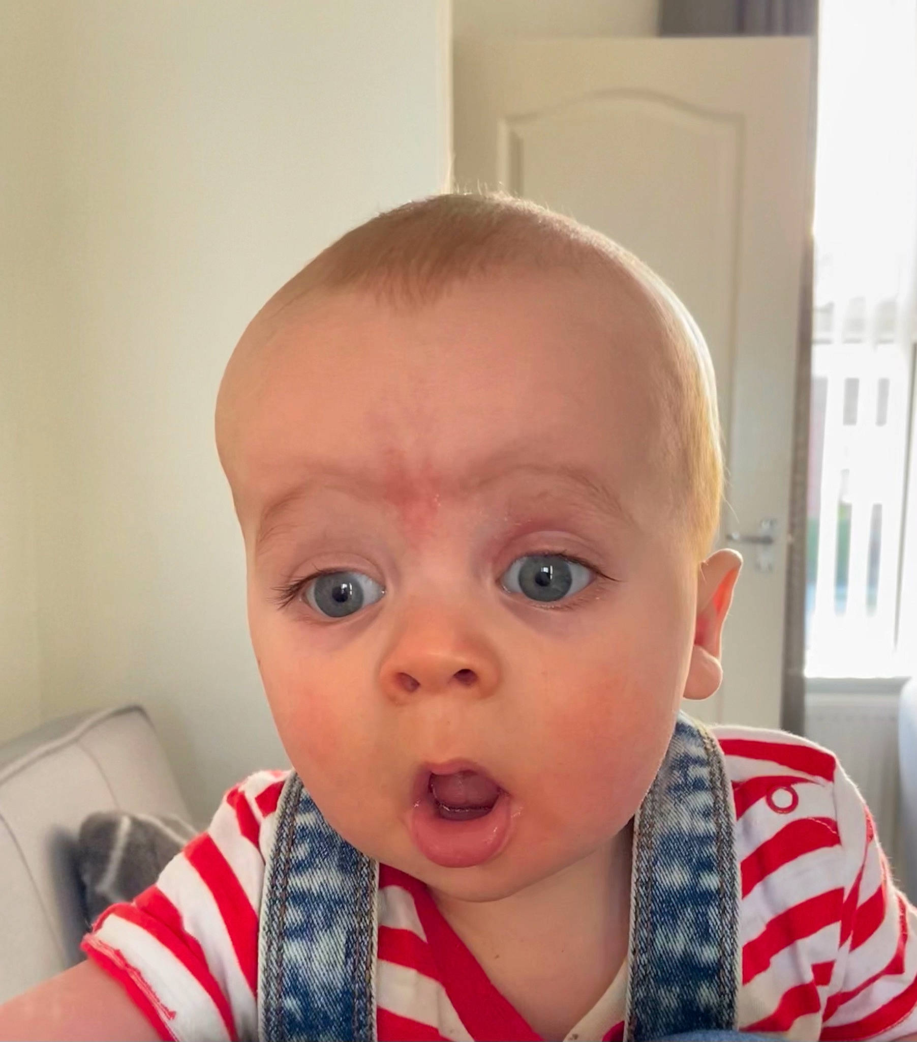 Joel is registered to the contest to win money with this photo: baby, baby_toddler_clothing, cheek, chin, cool, ear, eyebrow, eyelash, forehead, hairstyle, happy, iris, jaw, lip, mouth, neck, nose, person, skin, sleeve