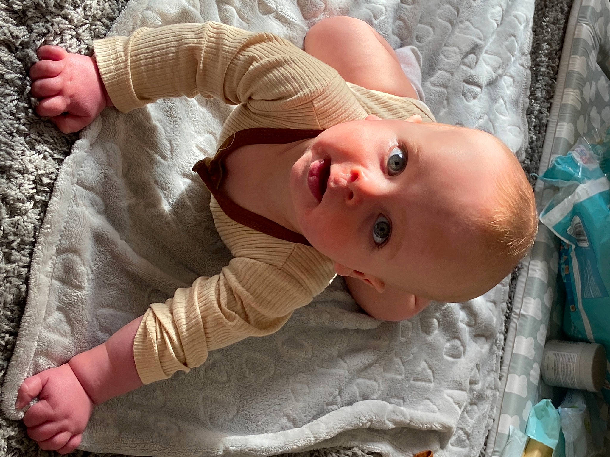 Joel is registered to the contest to win money with this photo: baby, baby_toddler_clothing, cheek, chest, child, comfort, eyelash, finger, grass, hat, iris, lip, mouth, nose, person, skin, sleeve, smile, toddler, tree