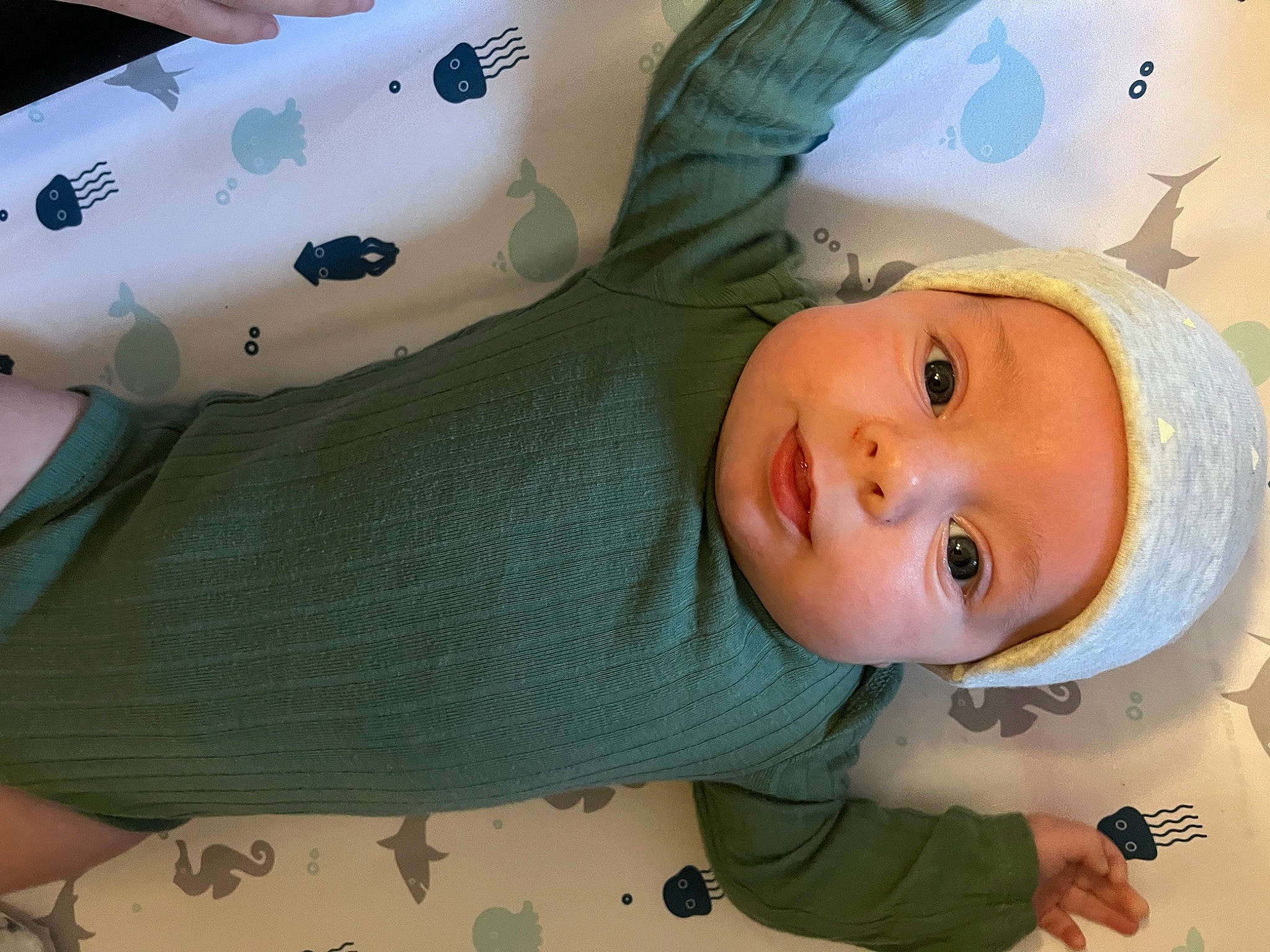 Ambrose is registered to the contest to win money with this photo: auto_part, baby, baby_products, baby_safety, car_seat, chair, cheek, child, comfort, fun, hat, headwear, linens, nose, pattern, person, plush, room, skin, stuffed_toy