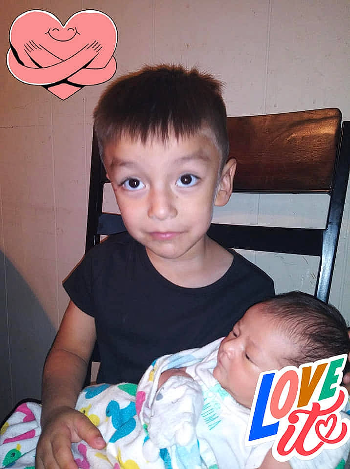 Julio joined the competition — help win amazing prizes! baby, baby_toddler_clothing, child, ear, person, play, sibling, sitting, smile, toddler