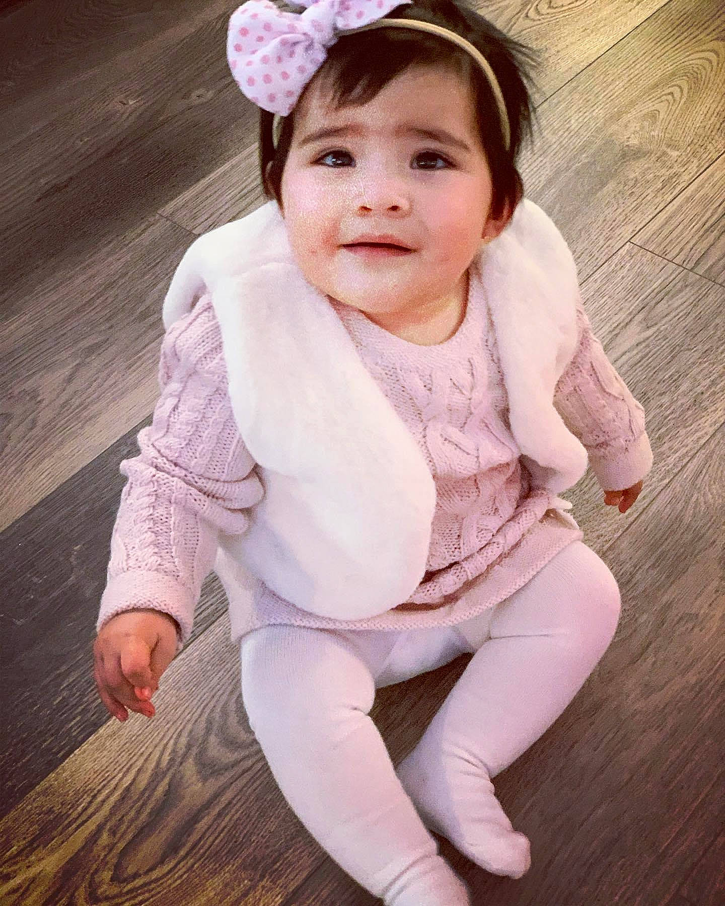 Daleyza joined the competition — help win amazing prizes! baby_toddler_clothing, cheek, child, child_model, costume_accessory, eye, face, floor, flooring, foot, hair_accessory, hardwood, headband, headpiece, joy, laminate_flooring, person, pink, skin, sleeve