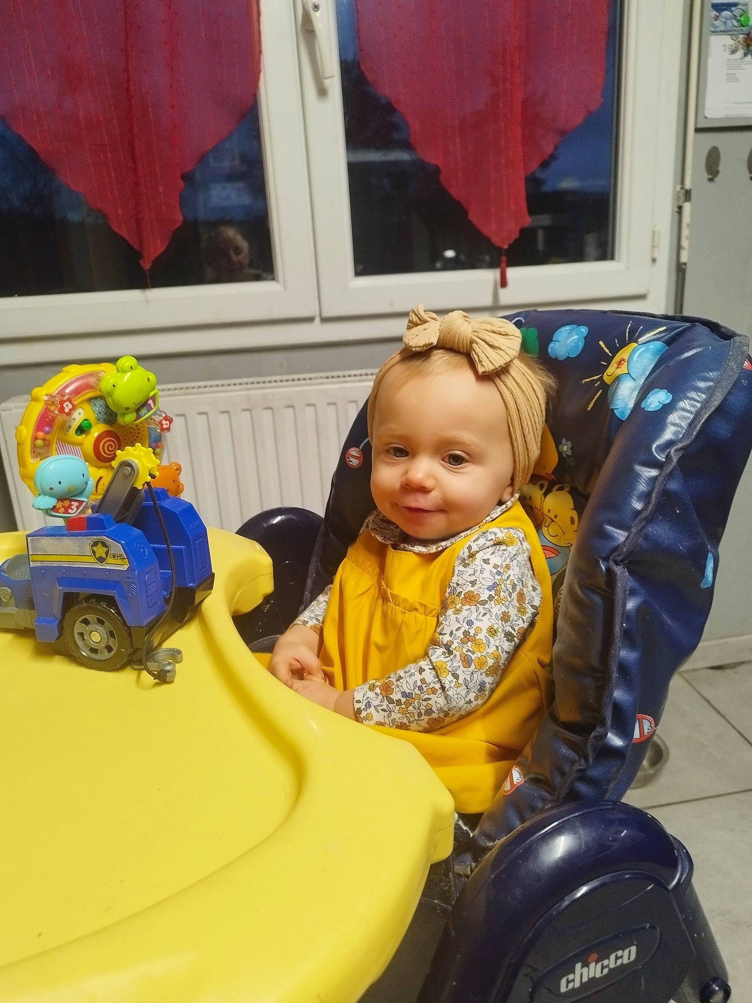 Nina participe au concours pour gagner de l'argent avec cette photo : automotive_tire, baby_products, child, fun, happy, leisure, motor_vehicle, person, picture_frame, play, recreation, riding_toy, sitting, smile, tire, toddler, toy, toy_vehicle, vehicle, wheel