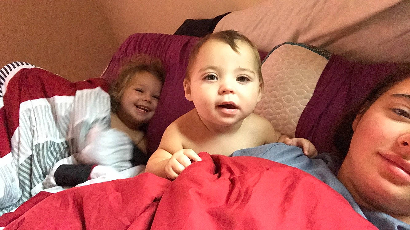 Jaxon is registered to the contest to win money with this photo: baby, bedtime, cheek, child, daughter, face, finger, fun, happy, head, joy, lip, mother, mouth, nose, people, person, sibling, skin, smile