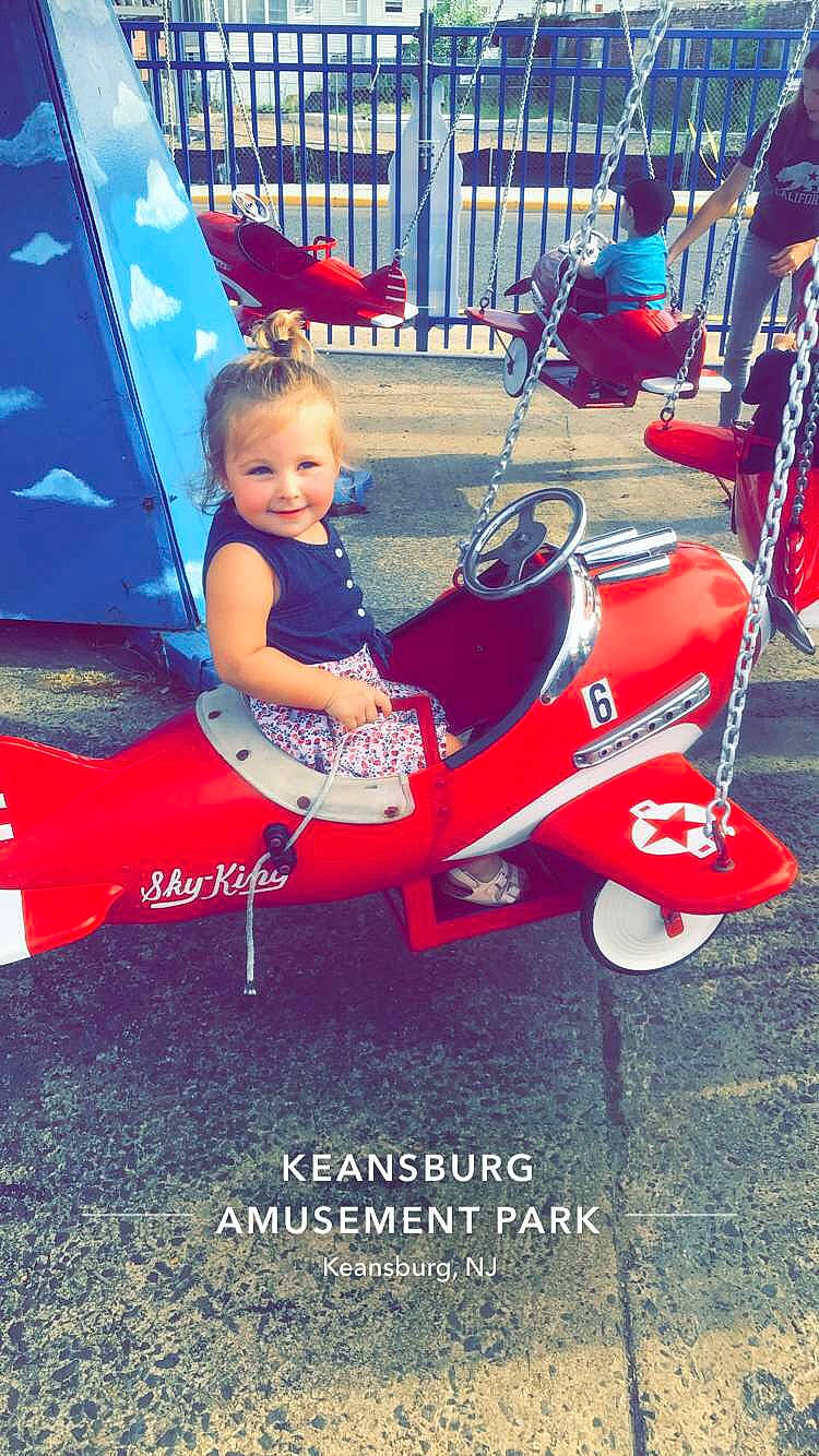 Savannah is registered to the contest to win money with this photo: amusement_ride, car, chair, child, joy, leisure, person, play, product, recreation, red, toddler, vacation, vehicle