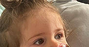 Victoire a rejoint le concours — aidez-le/la à gagner de superbes lots ! toddler, child, pacifier, pink, hair, loops, cute, face, earrings, portrait, indoor, soft, clothing, baby, expression, young_child, closeup, person, looking_away, resting
