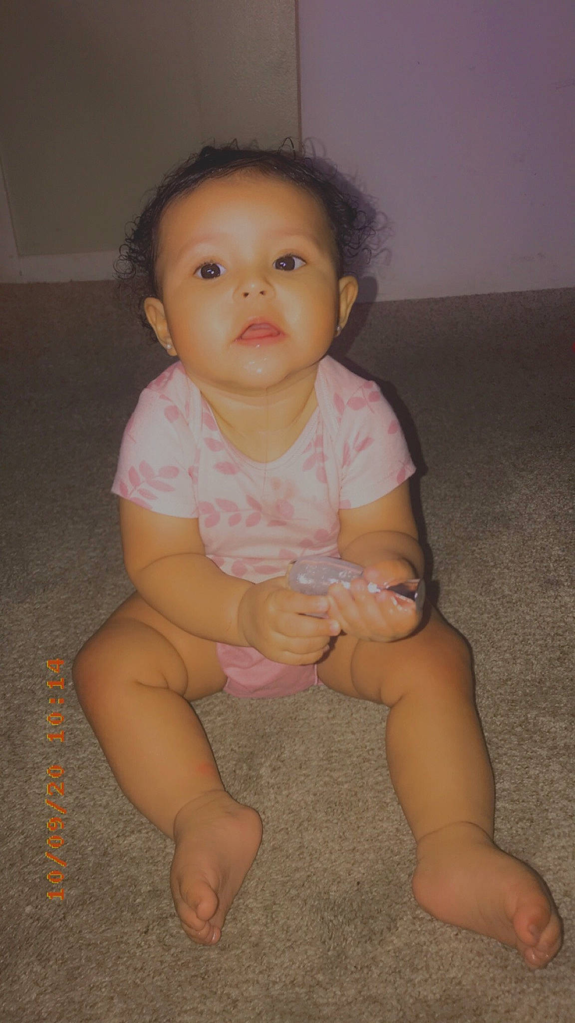 Aria is registered to the contest to win money with this photo: baby_toddler_clothing, cheek, chin, eye, eyebrow, face, finger, hair, iris, leg, lip, mouth, neck, nose, person, pink, skin, sleeve, standing, thigh