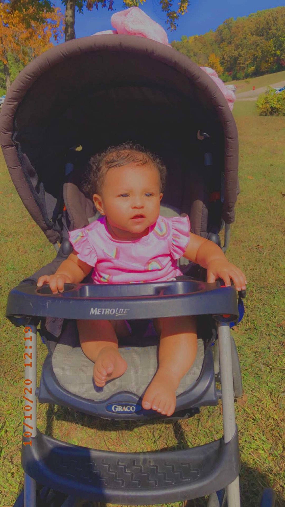 Aria joined the competition — help win amazing prizes! baby, baby_carriage, baby_products, baby_toddler_clothing, child, comfort, fun, grass, hat, lap, leisure, person, photograph, pink, plant, play, product, recreation, shade, sitting