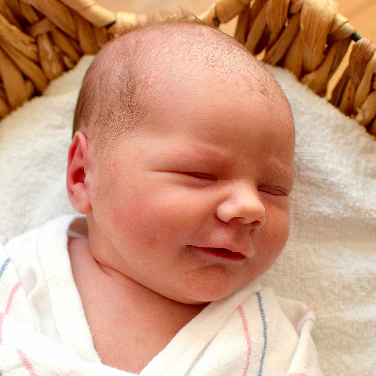 Reya is registered to the contest to win money with this photo: baby, basket, bed, blanket, cradle, crib, face, furniture, head, infantbed, newborn, person, photography, portrait, sleeping, towel