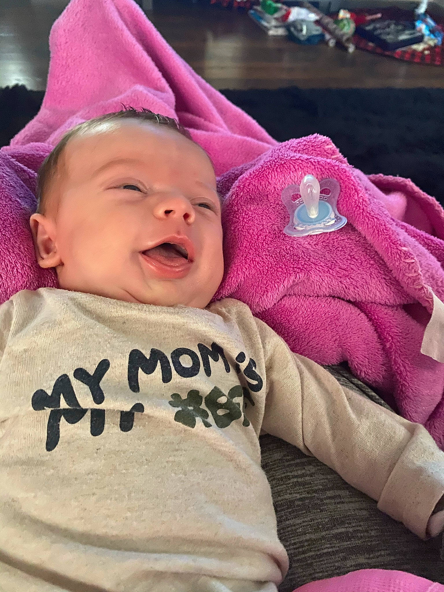 Oaklen joined the competition — help win amazing prizes! baby, baby_toddler_clothing, bonnet, cheek, child, facial_expression, laugh, lip, magenta, mouth, nose, person, pink, purple, skin, sleeve, textile, toddler, tongue, tooth
