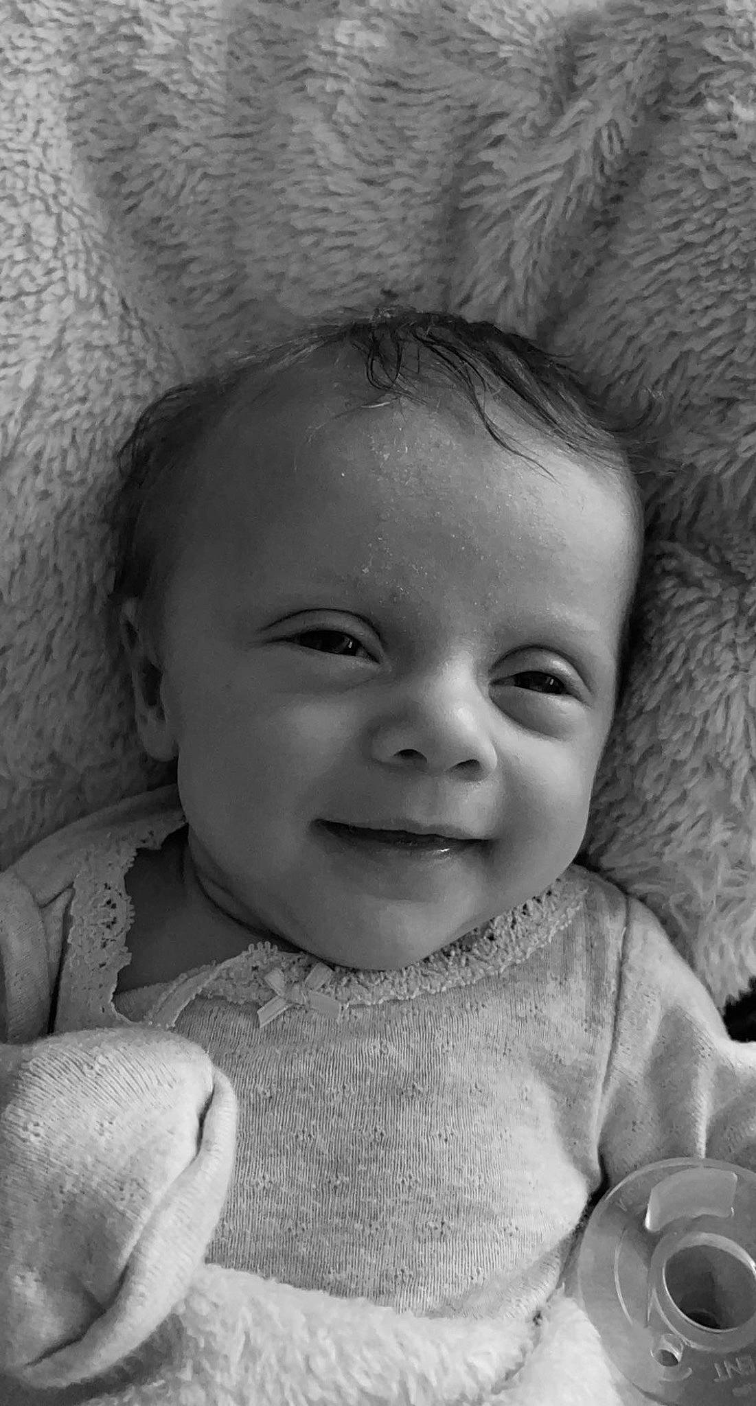 Kaiya is registered to the contest to win money with this photo: baby, black, cheek, chin, eye, eyebrow, face, facial_expression, head, human, iris, joy, lip, mouth, nose, organ, person, photograph, skin, sleeve