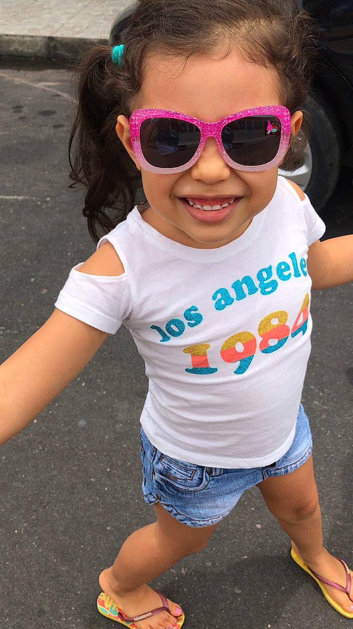 Isabella joined the competition — help win amazing prizes! child, cool, eyewear, fun, girl, glasses, hairstyle, joy, pattern, person, pink, product, purple, shoulder, skin, smile, sunglasses, t_shirt, toddler, vision_care