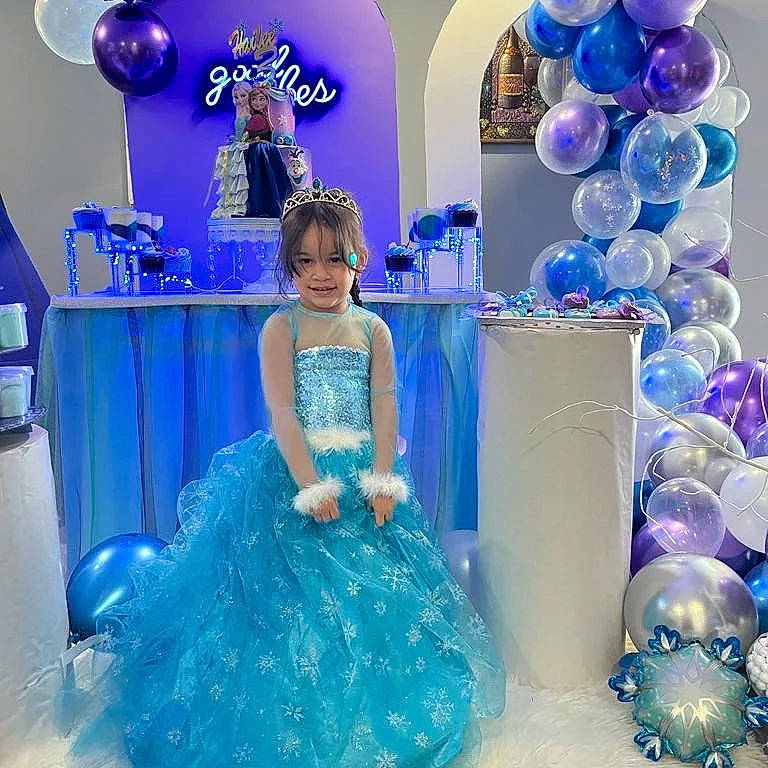 Hailee is registered to the contest to win money with this photo: aqua, azure, balloon, blue, day_dress, decoration, dress, electric_blue, event, fashion_design, fun, gown, happy, lighting, one_piece_garment, person, pink, product, purple, smile