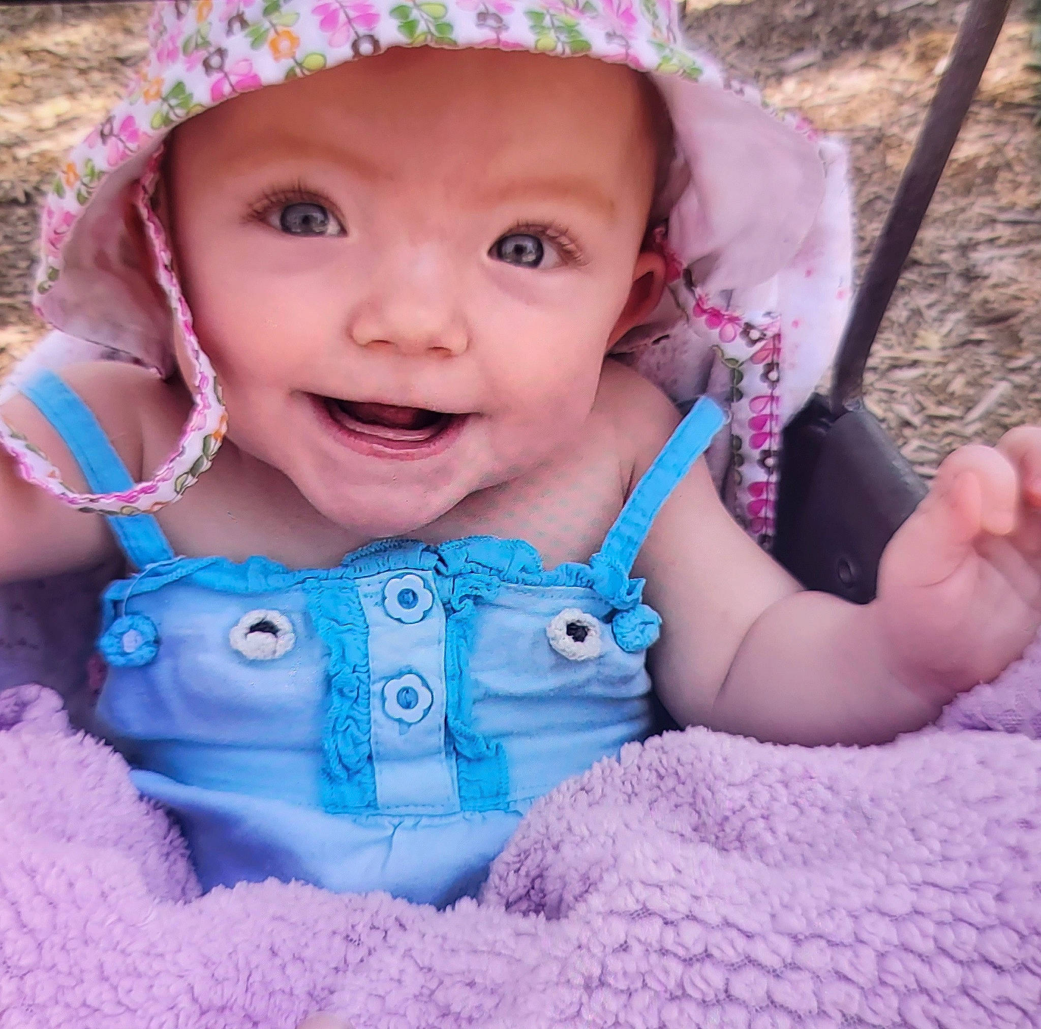 Serenity-lynn is registered to the contest to win money with this photo: baby_toddler_clothing, blue, cheek, clothing, face, facial_expression, hand, happy, headwear, human, iris, joy, lip, organ, person, photograph, pink, product, purple, skin