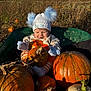 autumn, baby, child, clouds, cute, field, harvest, hat, mittens, nature, orange, outdoor, portrait, pumpkin, seasonal, sky, smiling, striped_pants, wheelbarrow, white_pumpkin