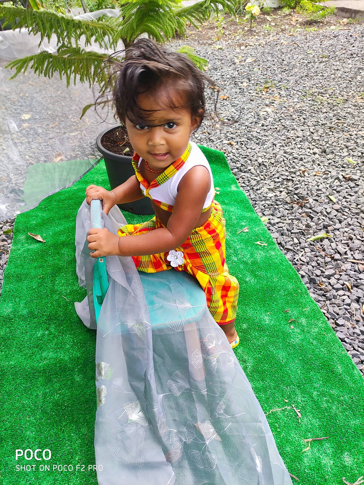 Djya participe au concours pour gagner de l'argent avec cette photo : baby, baby_toddler_clothing, child, clothing, day_dress, dress, embellishment, grass, green, happy, one_piece_garment, people_in_nature, person, summer, textile, toddler