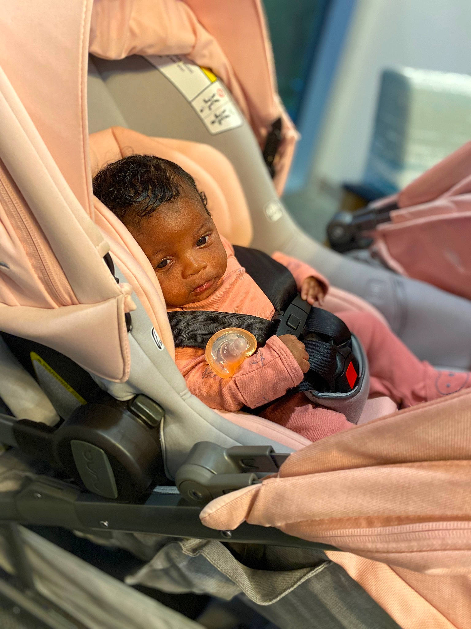 Legaci is registered to the contest to win money with this photo: auto_part, automotive_design, baby, baby_carriage, baby_products, baby_safety, baby_toddler_clothing, car_seat, child, comfort, event, fun, health_care, mammal, motor_vehicle, nail, person, service, sitting, skin