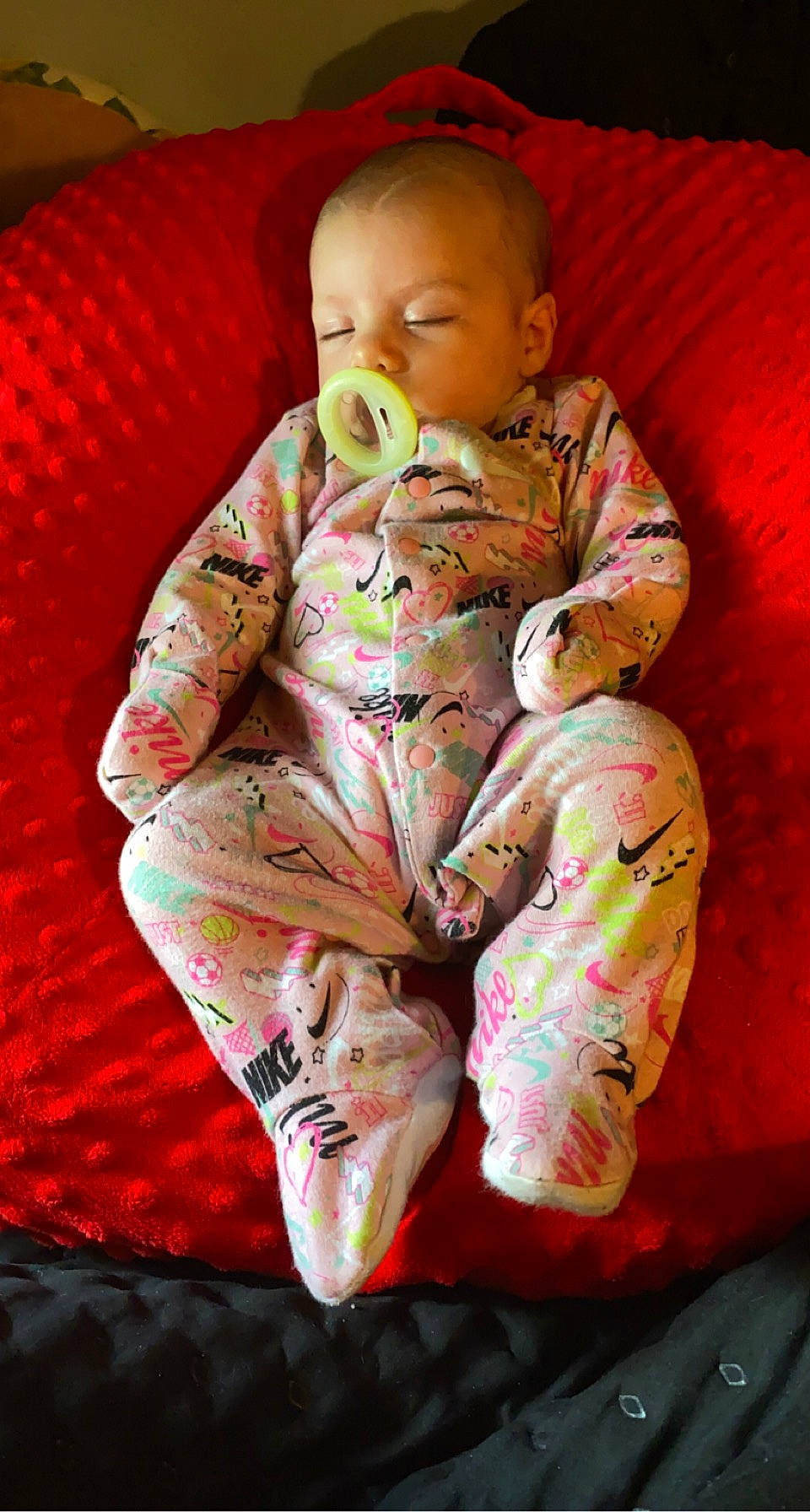 Vyolet Mays is registered to the contest to win money with this photo: baby, baby_toddler_clothing, cheek, child, comfort, face, foot, head, human_leg, knee, leg, linens, magenta, mouth, neck, person, pink, skin, sleeve, thigh