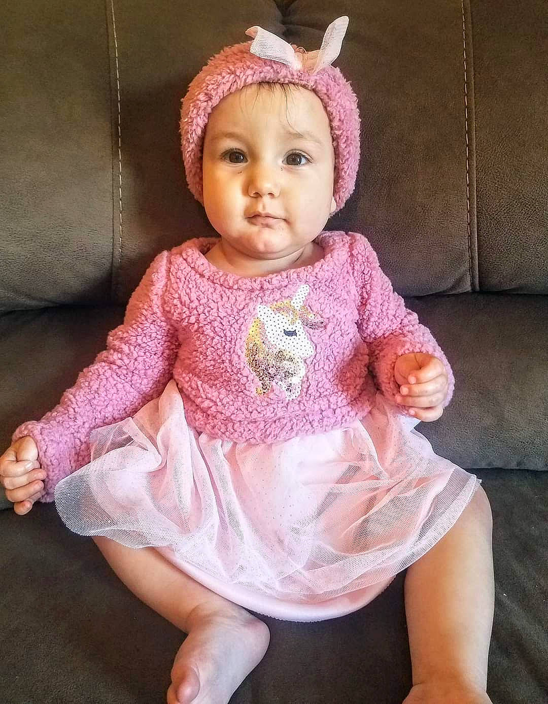 Ella joined the competition — help win amazing prizes! baby, baby_toddler_clothing, cap, cheek, costume_hat, dress, eye, face, happy, hat, head, headgear, headwear, human_body, knit_cap, lip, magenta, person, pink, skin